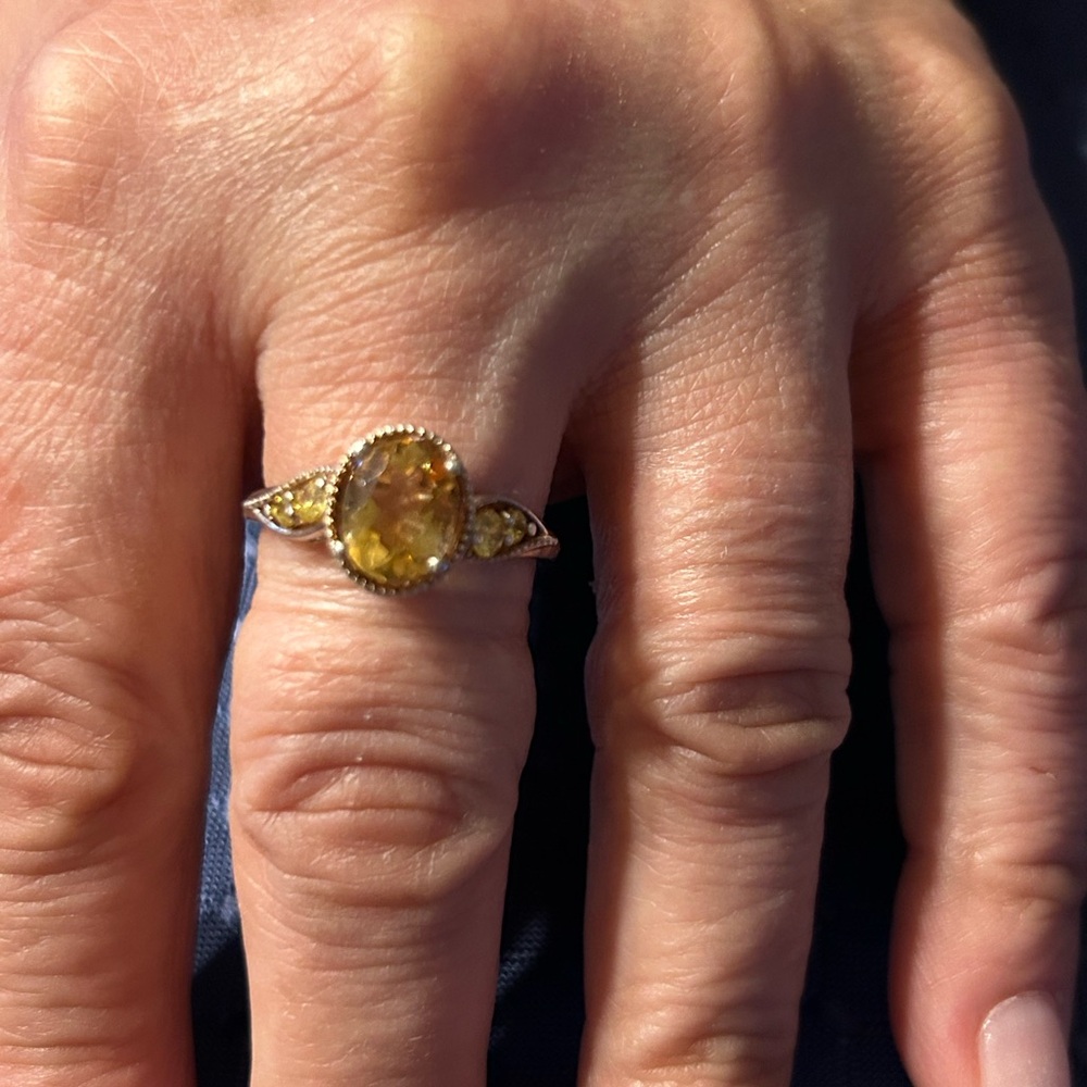 Elegant Sterling Silver Ring with Yellow Gemstones
